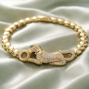 Gold Paved Panther Chain Bracelet with Green Eye Accent